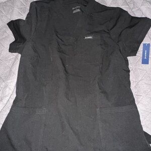 Jaanuu 3 pocket scrub top. Black. Large. NWT